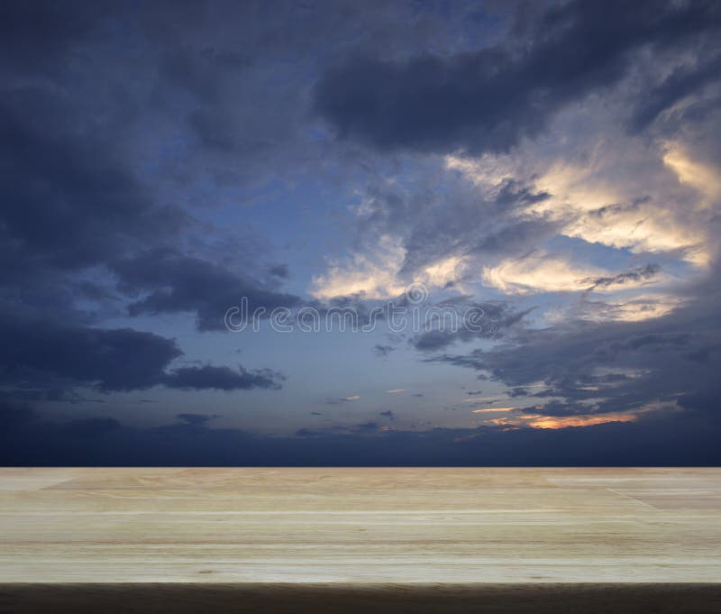 Empty Wooden Table Over Blue Sky for Your Product Display Montage Stock