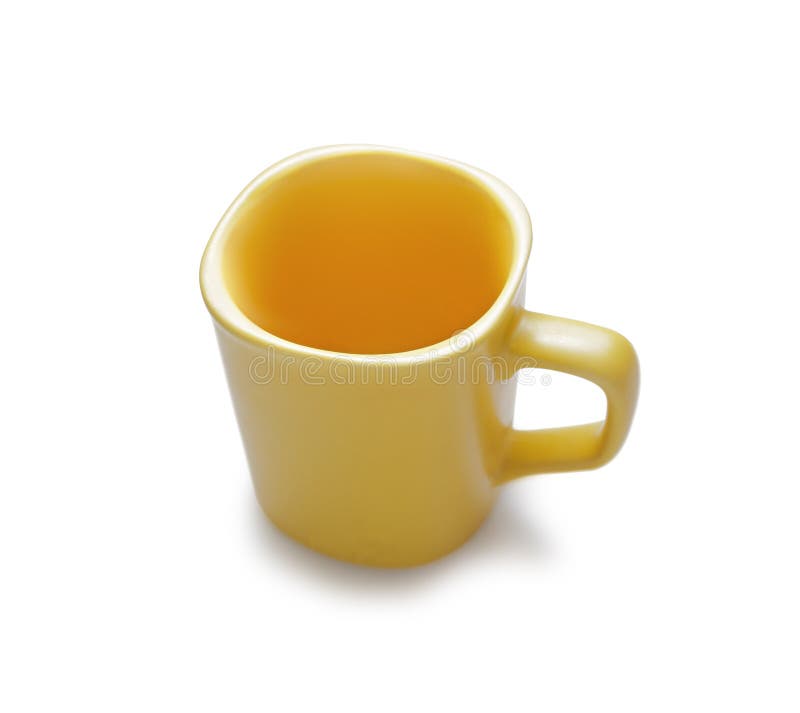 Empty yellow ceramic mug.