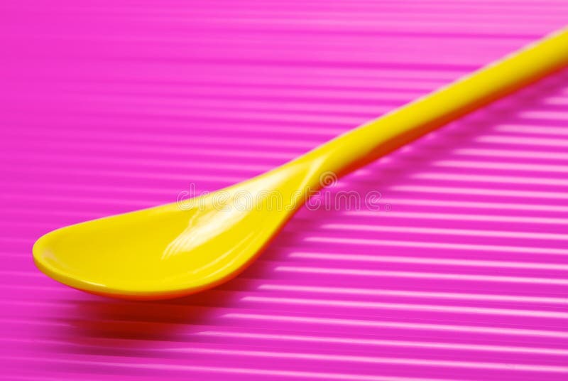 Empty yellow desert spoon royalty free stock photography