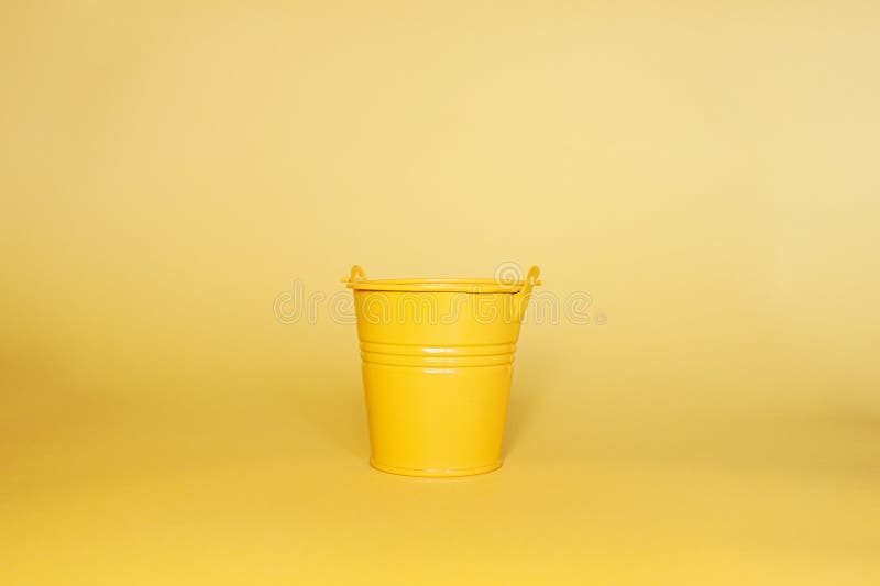 Empty Yellow Metal Miniature Bucket on a Clean Yellow Flat Background Stock Image Image of