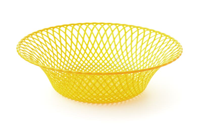Empty yellow plastic hollow fruit dish stock image.