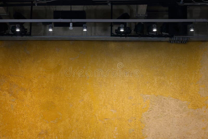 Empty yellow wall with light for exhibition room royalty free stock images