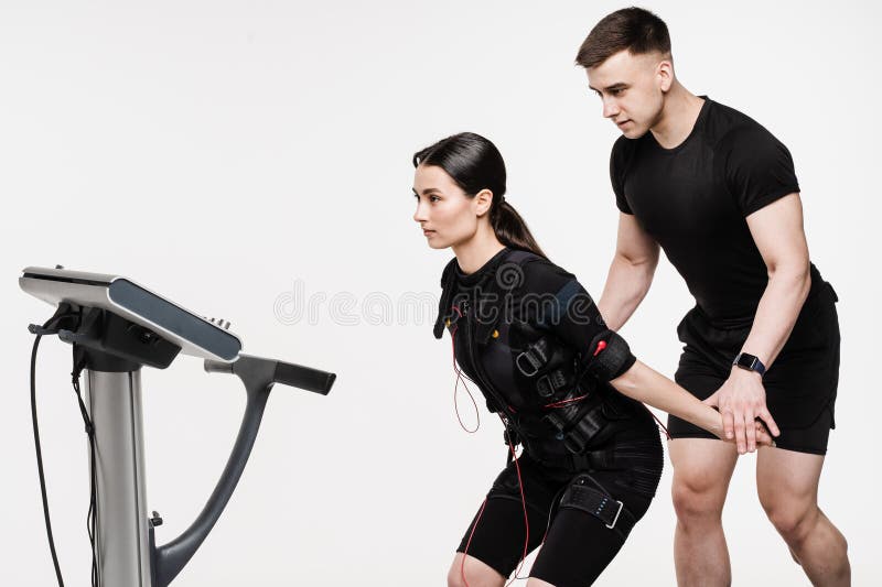 Premium Photo  Muscular male athlete in ems suit is doing workout sport  training that uses electrical impulses to stimulate muscles on white  background sport training in electrical muscle stimulation suit