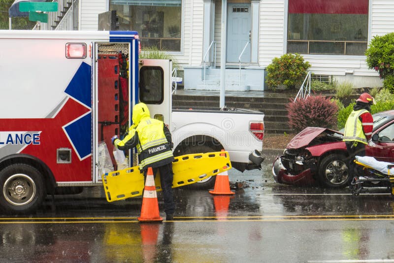 EMT technicians responding to traffic accident royalty free stock image EMT technicians responding to traffic accident royalty free stock image
