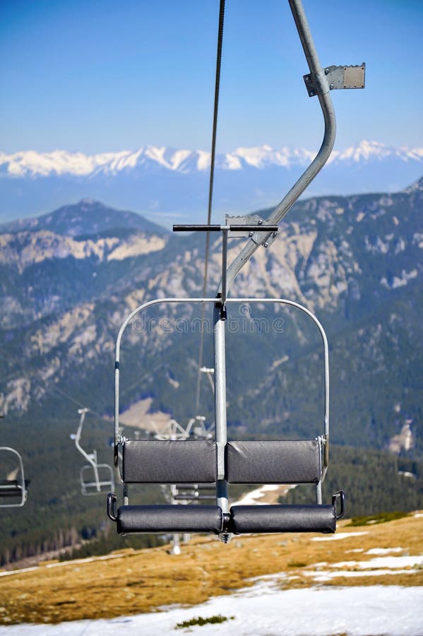 Emtpy chairlift in a Ski Resort on sunny summer day