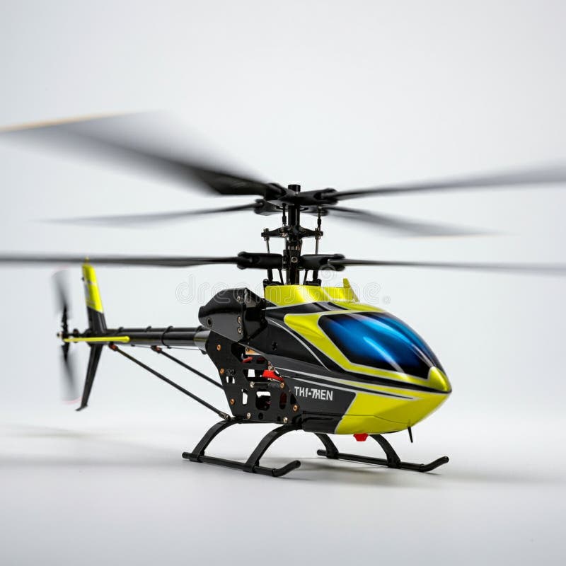 En detaljerad modellhelikopter med elegant design med framträdande gult och stock illustrationer