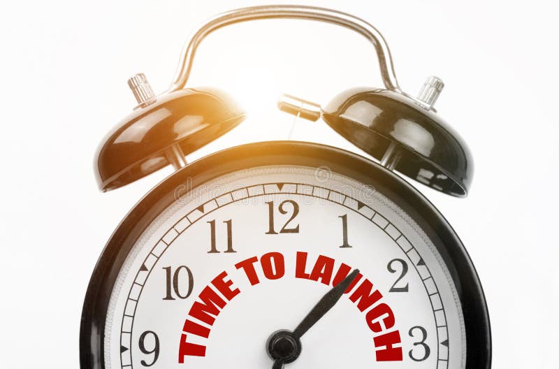 En el dial del reloj despertador el tiempo de inscripción para iniciar imagen de archivo