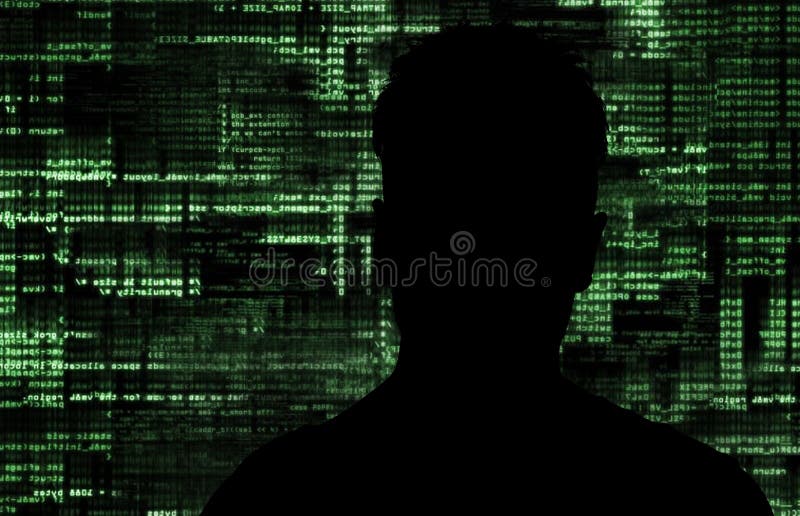 En hacker på arbete arkivbild En hacker på arbete arkivbild