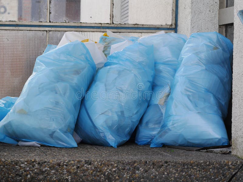 A pile of full garbage bags in a dump. See my other works in portfolio. A pile of full garbage bags in a dump. See my other works in portfolio.