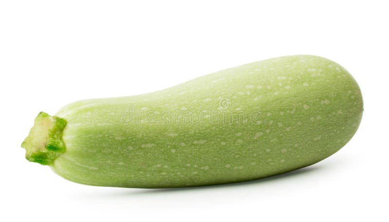 En mogen zucchinicloseup på en vit isolerat arkivfoto En mogen zucchinicloseup på en vit isolerat arkivfoto