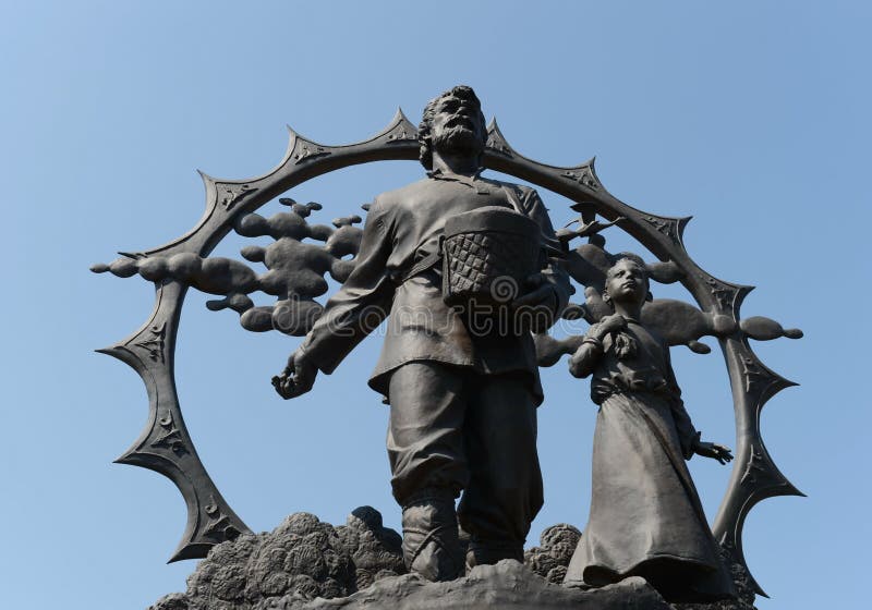 En monument till nybyggarna i Altaien på fyrkanten av Oktober i Barnaul