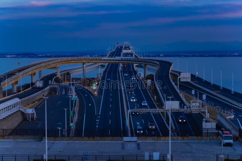 A dusk traffic jam on the highway at Tokyo bay area in Chiba. High quality photo. Kisarazu district Chiba Japan 01.30.2024 Here is the highway parking called UMIHOTARU PA in Chiba Japan. A dusk traffic jam on the highway at Tokyo bay area in Chiba. High quality photo. Kisarazu district Chiba Japan 01.30.2024 Here is the highway parking called UMIHOTARU PA in Chiba Japan.