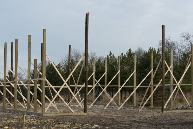 A pole Barn under construction on a farm in Minnesota. A pole Barn under construction on a farm in Minnesota