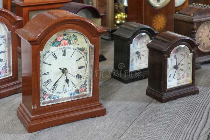 A collection of antique carriage clocks that illustrate the concept of time. A collection of antique carriage clocks that illustrate the concept of time