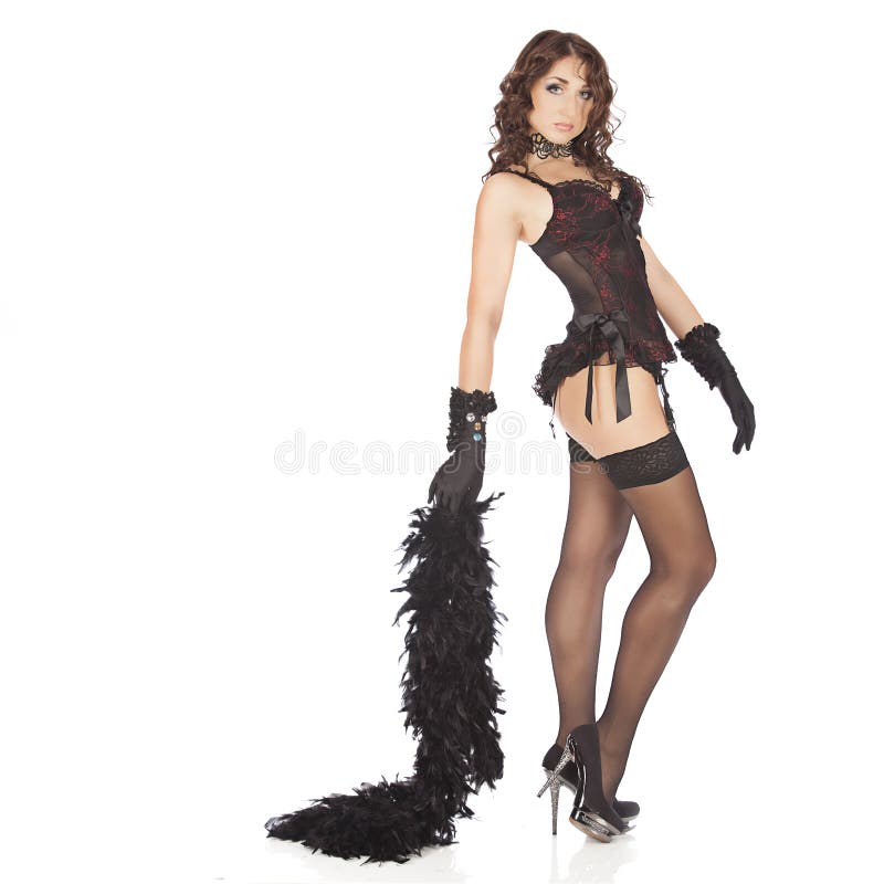 One burlesque dancer woman stripper showgirl in studio isolated on white background. One burlesque dancer woman stripper showgirl in studio isolated on white background.