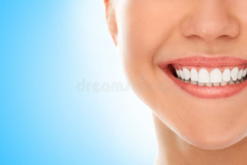 En un dentista con una sonrisa fotografía de archivo En un dentista con una sonrisa fotografía de archivo