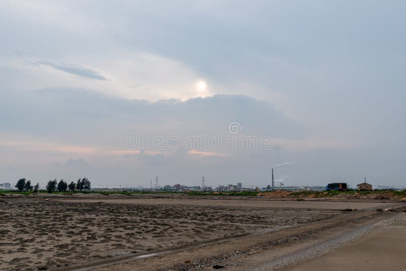 A road piled up on saline alkali land, a salt pond. A road piled up on saline alkali land, a salt pond.