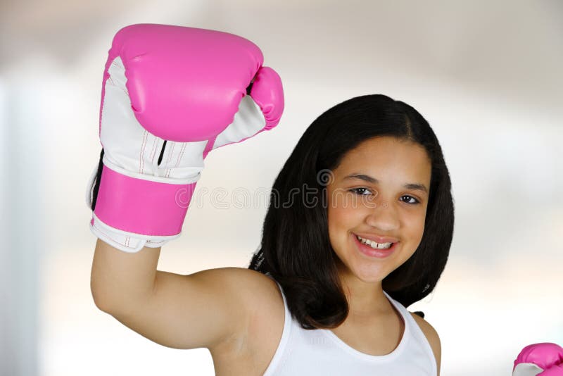 Encaixotamento da menina imagem de stock royalty free Encaixotamento da menina imagem de stock royalty free