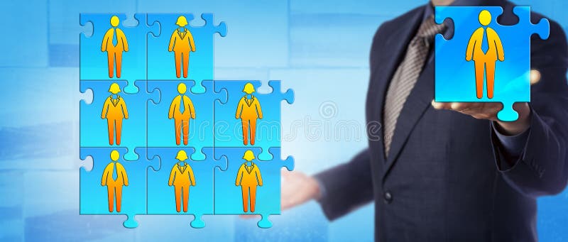 Unrecognizable male business director is offering the final piece to complete his work team puzzle. Human resources concept for team building, collaboration, cooperation and succession planning. Unrecognizable male business director is offering the final piece to complete his work team puzzle. Human resources concept for team building, collaboration, cooperation and succession planning.