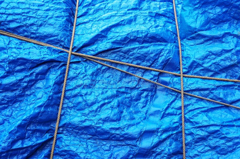 Texture of plastic waterproof tarpaulin with rope. Texture of plastic waterproof tarpaulin with rope