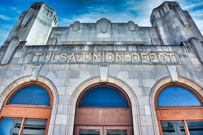 The main facade and entrance way to the historic, art deco drenched, Union Pacific Station. Tulsa, Oklahoma is host to a great deal of the art deco style of architecture. Perhaps none is so notable as the historic railroad station of the Tulsa Union Pacific Railroad. Now the tracks are used by Burlington Northern and Santa Fe and the building houses a jazz music museum. The main facade and entrance way to the historic, art deco drenched, Union Pacific Station. Tulsa, Oklahoma is host to a great deal of the art deco style of architecture. Perhaps none is so notable as the historic railroad station of the Tulsa Union Pacific Railroad. Now the tracks are used by Burlington Northern and Santa Fe and the building houses a jazz music museum