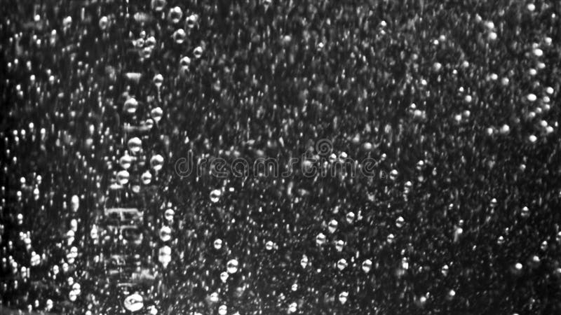 Close-up of rising soda bubbles. Stock footage. Macro shot of slowly rising carbonated bubbles on gray background. Beautiful bubbles of sparkling water make you thirsty. Close-up of rising soda bubbles. Stock footage. Macro shot of slowly rising carbonated bubbles on gray background. Beautiful bubbles of sparkling water make you thirsty.