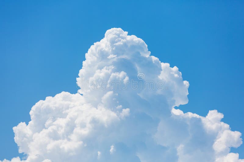 Large volume white cloud close-up, similar to ice cream or whipped cream, concept. Large volume white cloud close-up, similar to ice cream or whipped cream, concept