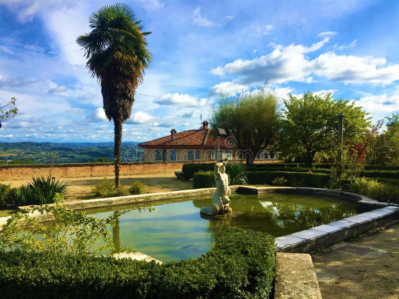 Enchanting Govone castle`s garden, Piedmont region, Italy. Art, architecture, fountain, history and urban design
