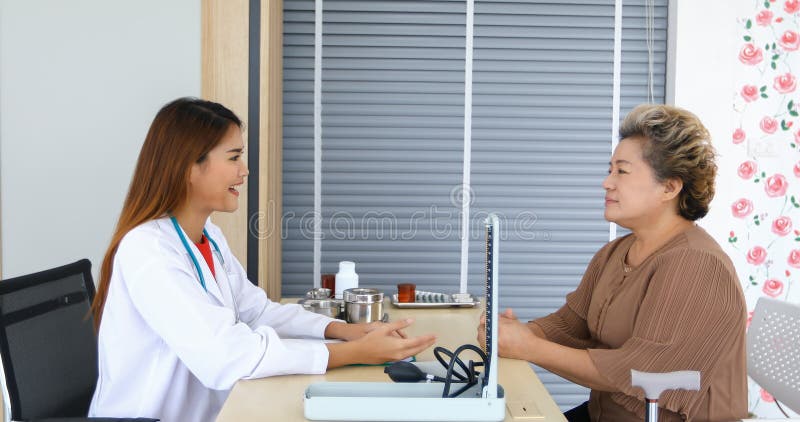 Doctor meeting and explaining medication to old women patient  at Hospitals. Doctor meeting and explaining medication to old women patient  at Hospitals.