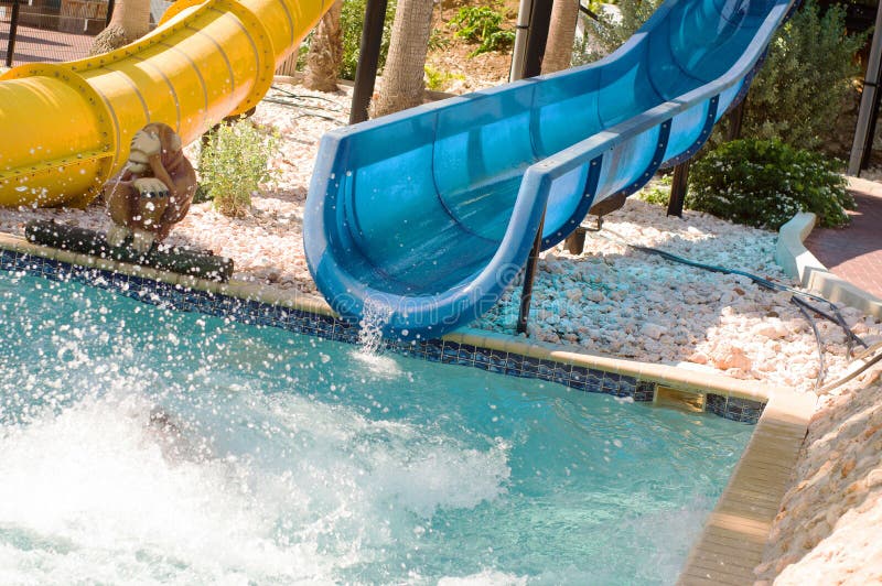 End of blue water slide royalty free stock photography