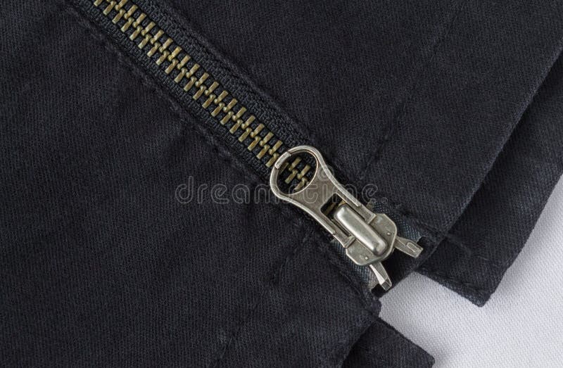 End of Closed Brass Zip on Black Jeans Texture Background Stock Photo ...