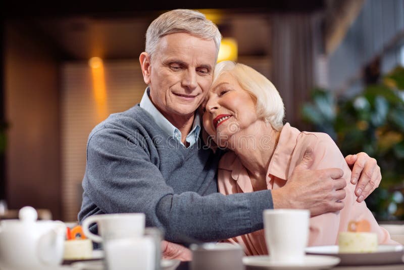 Gay mature couple cuddling stock images Gay mature couple cuddling stock images