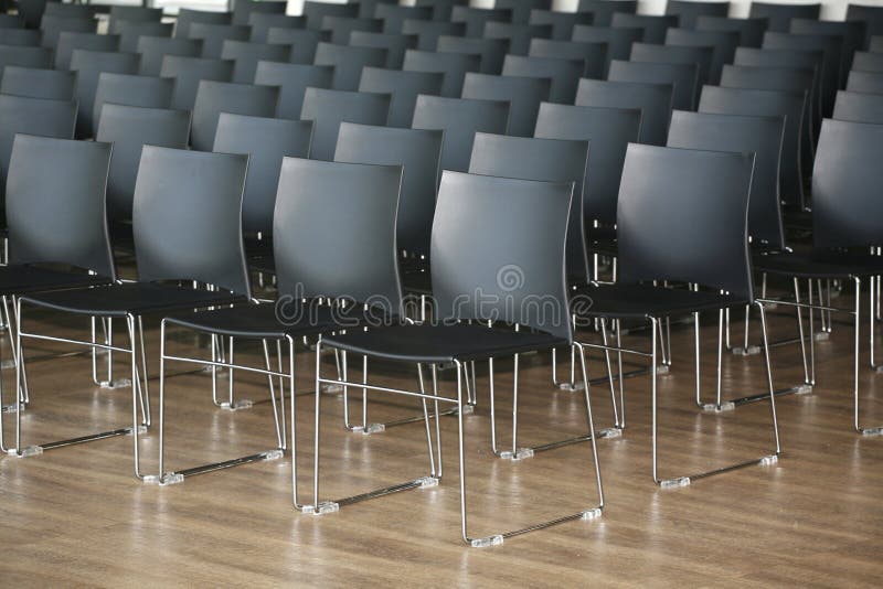 Endless Rows of Chairs in a Modern Conference Hall Stock Photo Image