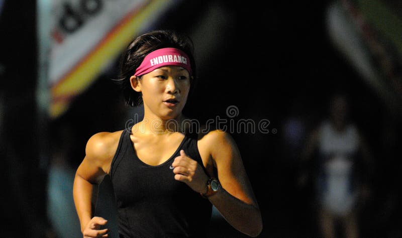 Endurance Head Band on Woman Marathon Runner