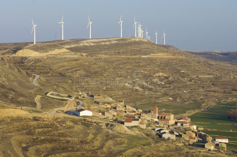 Windmills and small village in Spain. Windmills and small village in Spain