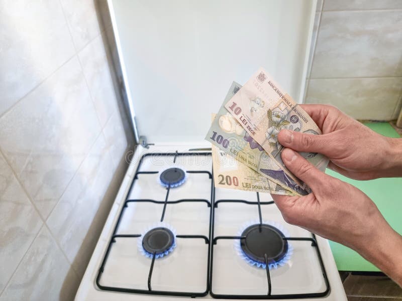 Energy efficiency concept with gas cooker and LEI, the Romanian money â€“ the cost of natural gas is more expensive in Romania.