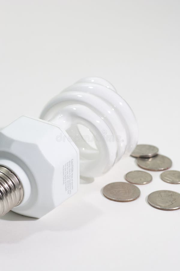 Energy Saving Bulb and Spare Change Stock Image Image of change