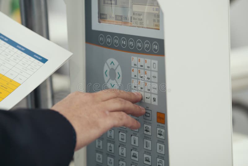 Energy security - system management panel. Man worker manipulates for Industrial remote control royalty free stock photos Energy security - system management panel. Man worker manipulates for Industrial remote control royalty free stock photos