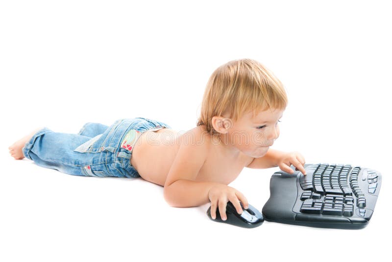 Enfant avec le clavier et la souris photos stock Enfant avec le clavier et la souris photos stock
