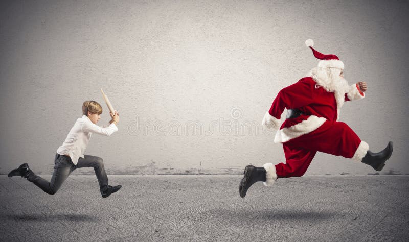 Enfant fâché avec Santa Claus image libre de droits Enfant fâché avec Santa Claus image libre de droits