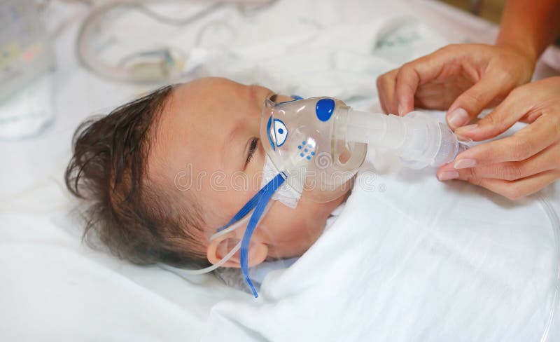 Sick Baby Boy Applying Inhale Medication By Inhalation Mask To Cure Respiratory Syncytial Virus Rsv On Patient Bed At Hospital Image Stock Image Du Infant Asthme