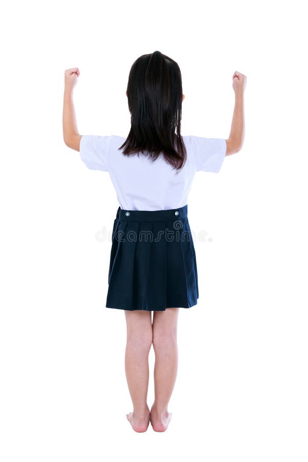 Enfant préscolaire dans l'uniforme avec ses mains au studio D'isolement image libre de droits Enfant préscolaire dans l'uniforme avec ses mains au studio D'isolement image libre de droits