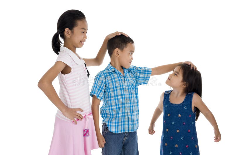 Children with different sizes, isolated on white background. Children with different sizes, isolated on white background