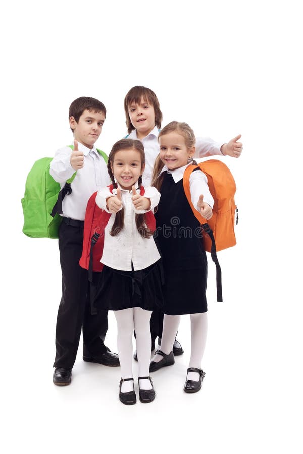 Enfants heureux d'école primaire - d'isolement photo stock Enfants heureux d'école primaire - d'isolement photo stock
