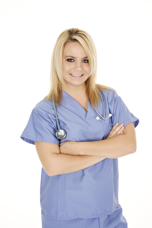 Médico ou enfermeiro caucasiano de scrubs azuis imagem de stock