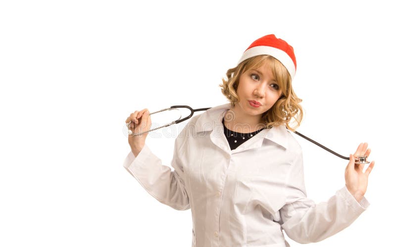 Enfermeira em um chapéu de Santa imagem de stock Enfermeira em um chapéu de Santa imagem de stock