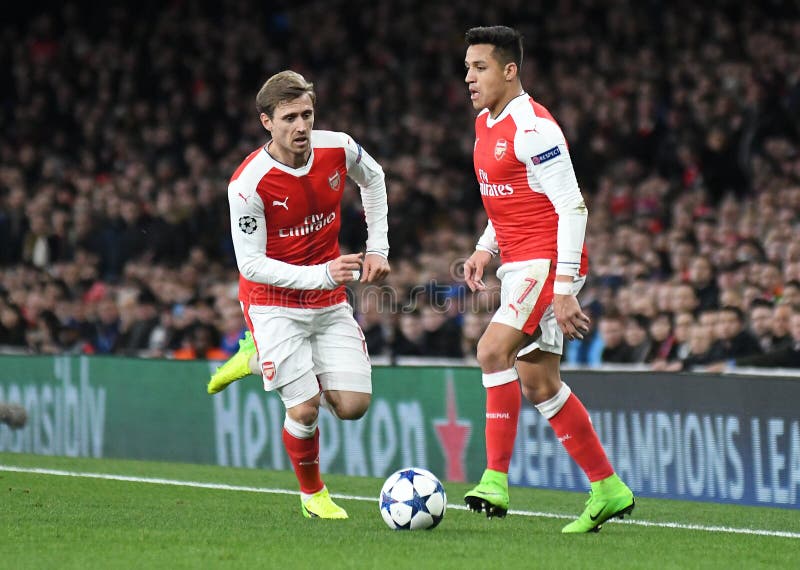 Nacho Monreal and Alexis Sanchez. LONDON, ENGLAND - MARCH 7, 2017: Nacho Monreal L and Alexis Sanchez R of Arsenal pictured in action during the second leg of