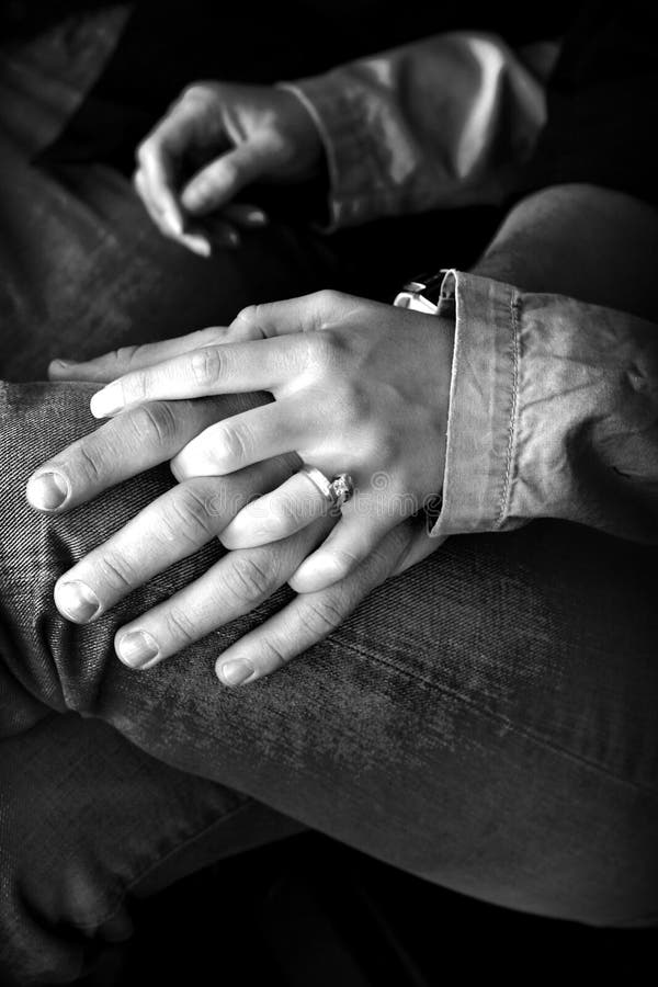 Engaged Couple Holding Hands