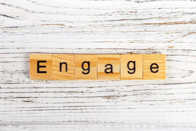 ENGAGEZ le mot fait avec le concept en bois de blocs images stock ENGAGEZ le mot fait avec le concept en bois de blocs images stock