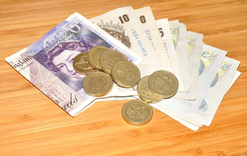 Engelse Bankbiljetten en Muntstukken stock afbeelding Engelse Bankbiljetten en Muntstukken stock afbeelding